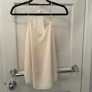 Medium White Club Monaco silk spaghetti flowy tank with racer back and v neck